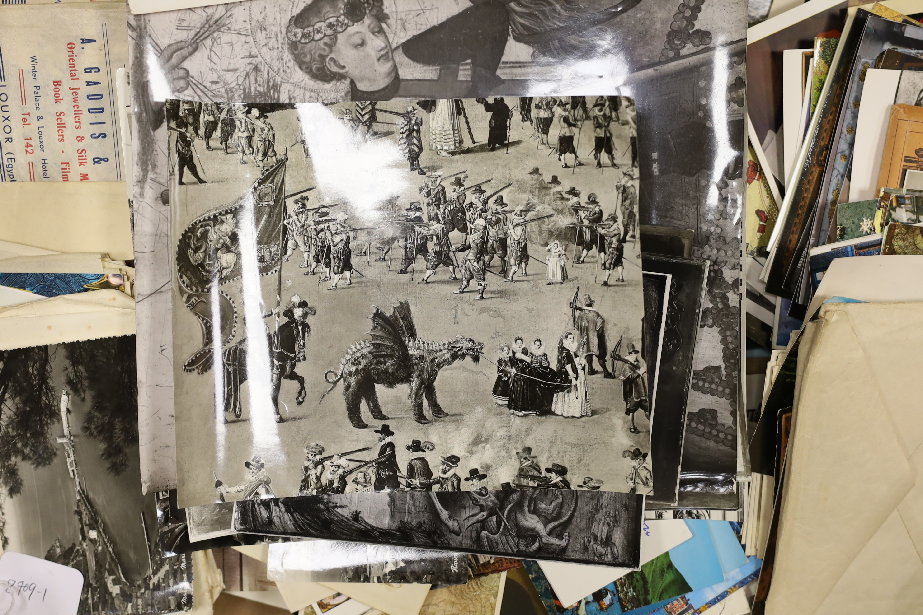 A quantity of postcards photos